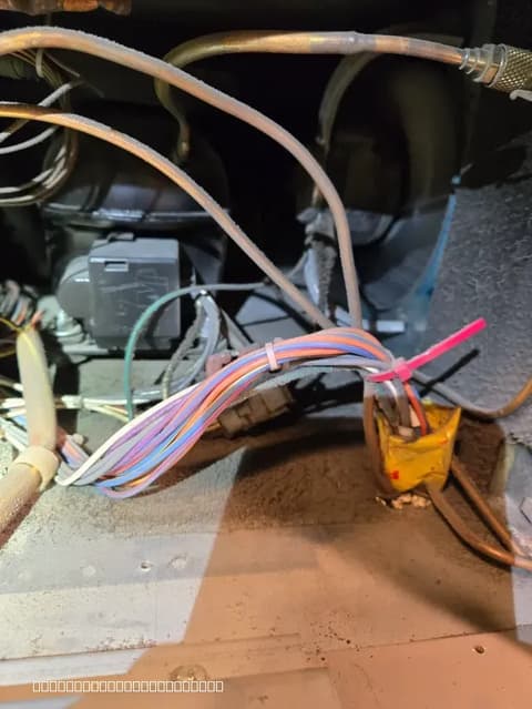 Refrigerator compressor wiring repair in progress, ensuring safe and reliable electrical function for Elk Grove residents.